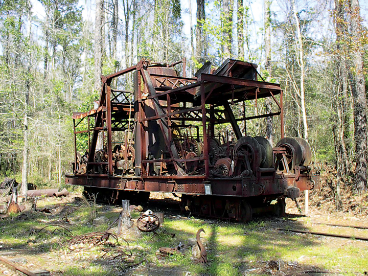 This 1919 Clyde Rehaul skidder, the last surviving machine of its kind in the world, exists today at Long Leaf without its booms. Enough booms are present on the site to enable a complete reconstruction. Courtesy of Southern Forest Heritage Museum, Photo by Everett Lueck.