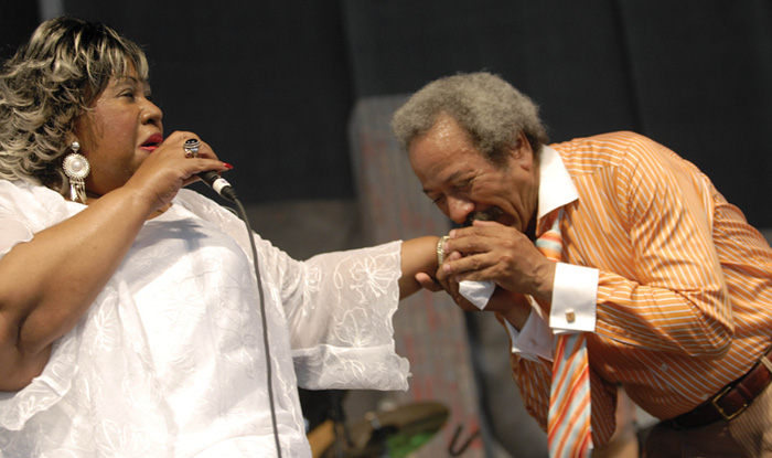After performing a duet, Allen Toussaint kisses singer Marva WrightÕs hand at the 2007 New Orleans Jazz and Heritage Festival.Photo by Cheryl Gerber