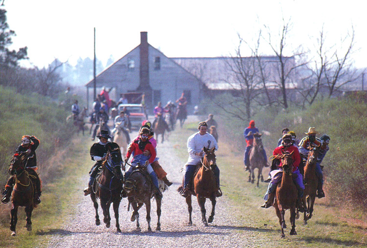 Mardi Gras runners charge chosen farmsteads as soon as their capitaine has been granted permission from the homeowner. As the day wearson many runners are relegated to pickup trucks due to "drunk riding."