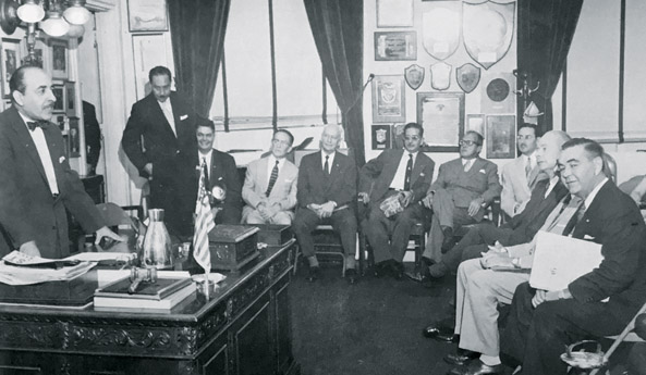 Councilman Victor Schiro receving members of the Cuban delegation at City Hall during a trip to New Orleans in 1956. Courtesy of International Trade Mart