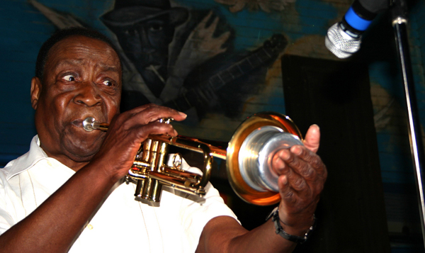 Dave Bartholomew playing the trumpet