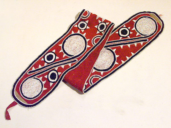 Sash with Scroll and Sun Designs