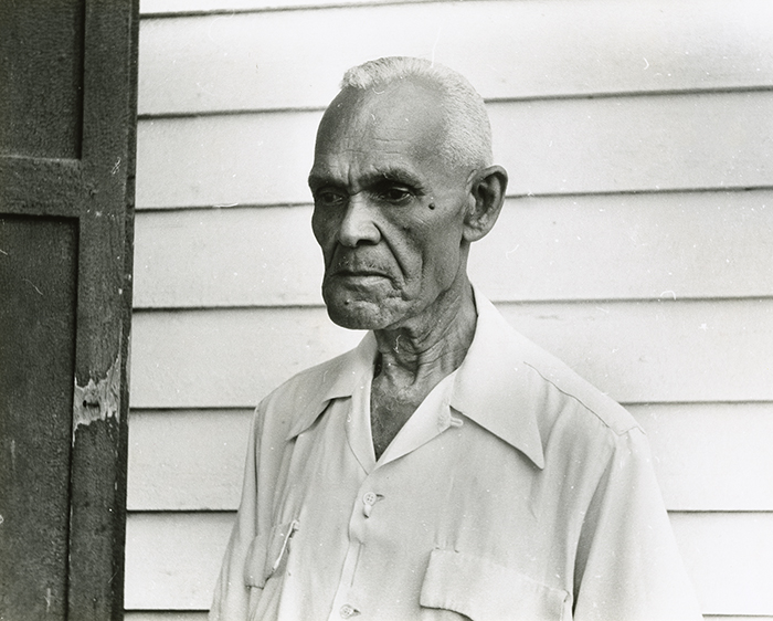 John ‘Papa’ Joseph outside barber shop