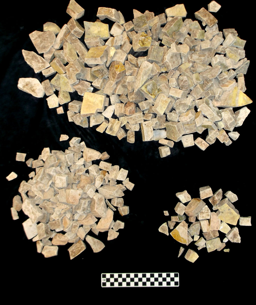 Fragments of a burned and shattered 18th-century storage jar