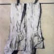 Stockings with Clothespins, charcoal pencil and white conté crayon, 1994