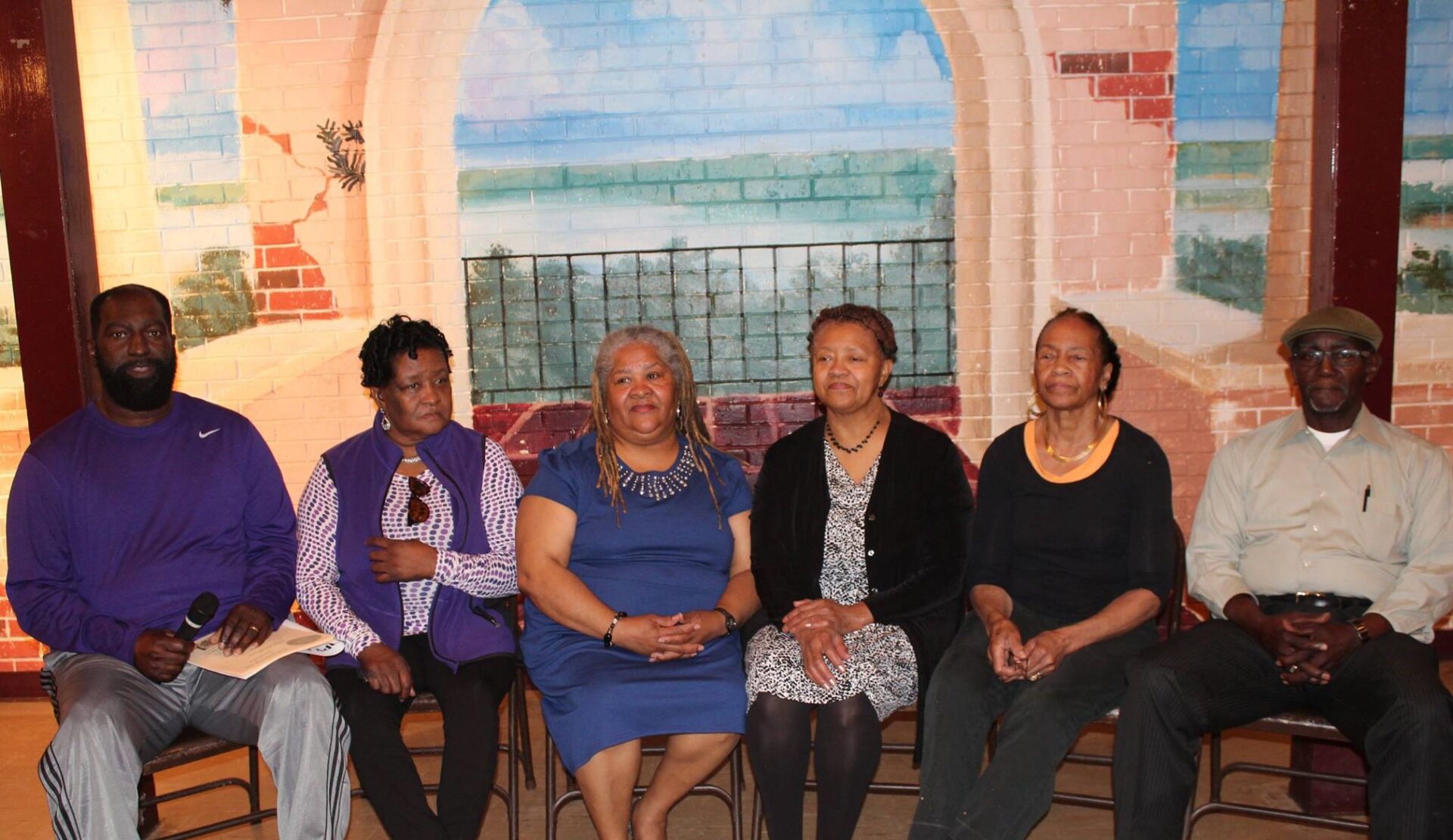 Descendants of M. C. Moore discussing desegregation at the Tangipahoa African American Heritage Museum and Veteran Archives