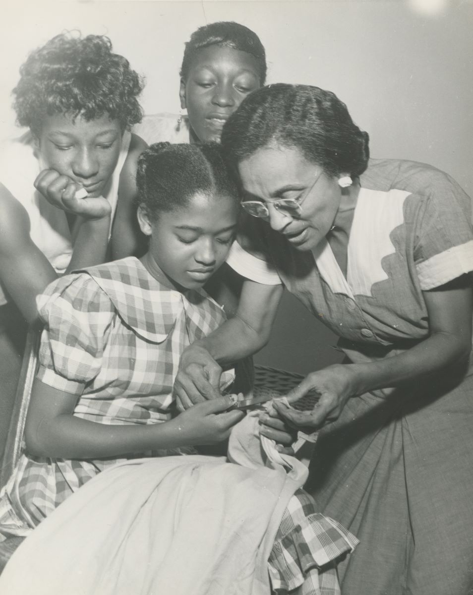 Fannie C. Williams Teaching Sewing