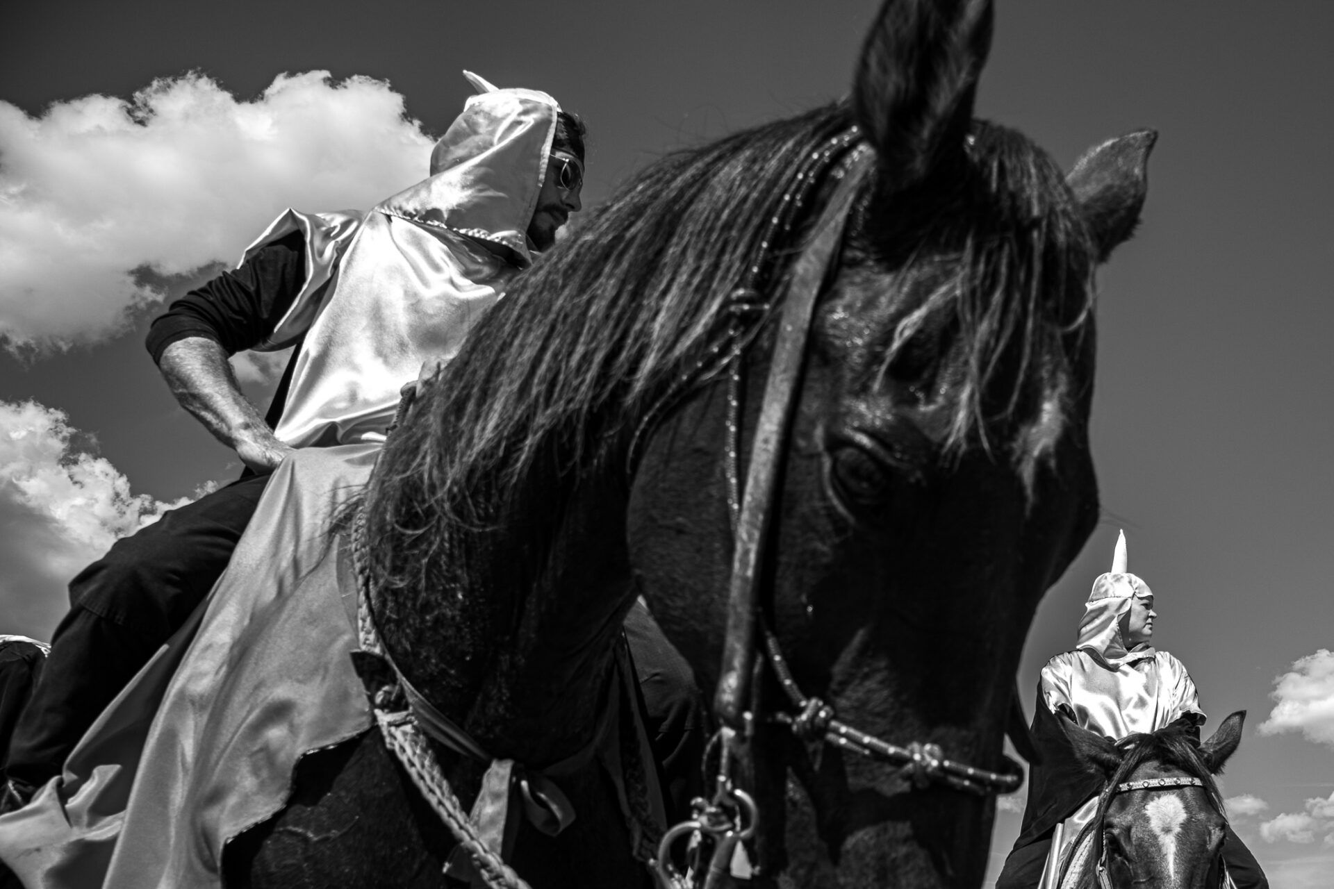 A man and woman on horses